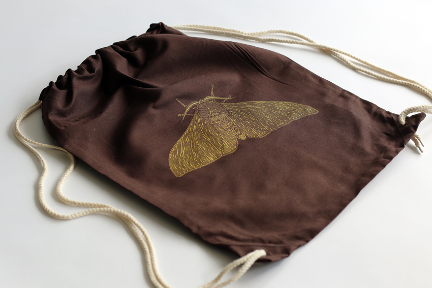 Brown gymsac with golden Peppered moth (GS005)